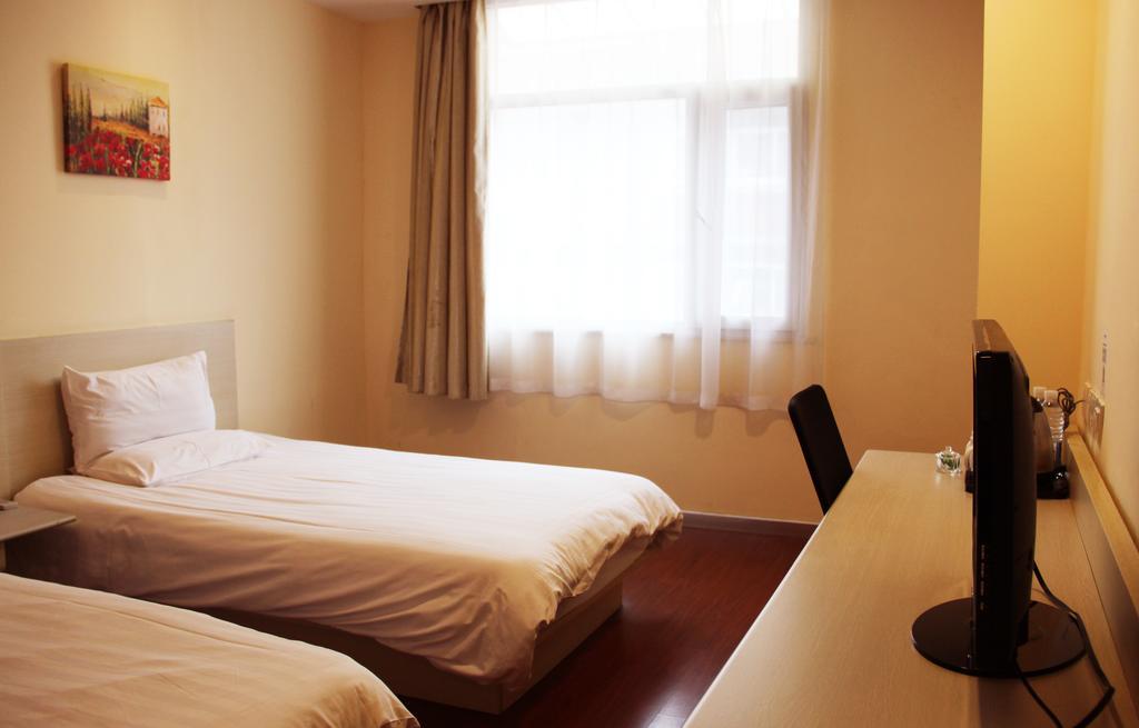 Hanting Hotel Ningbo Tian Yi Square Newbranch Habitación foto